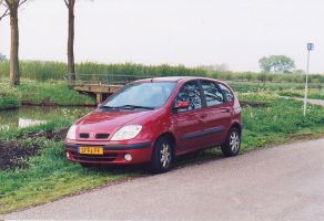De negende, mijn eerste Renault Scenic in de lease. 1600cc benzinemotor. Fijne luxe uitgevoerde auto, veel kilometers gemaakt Example Image